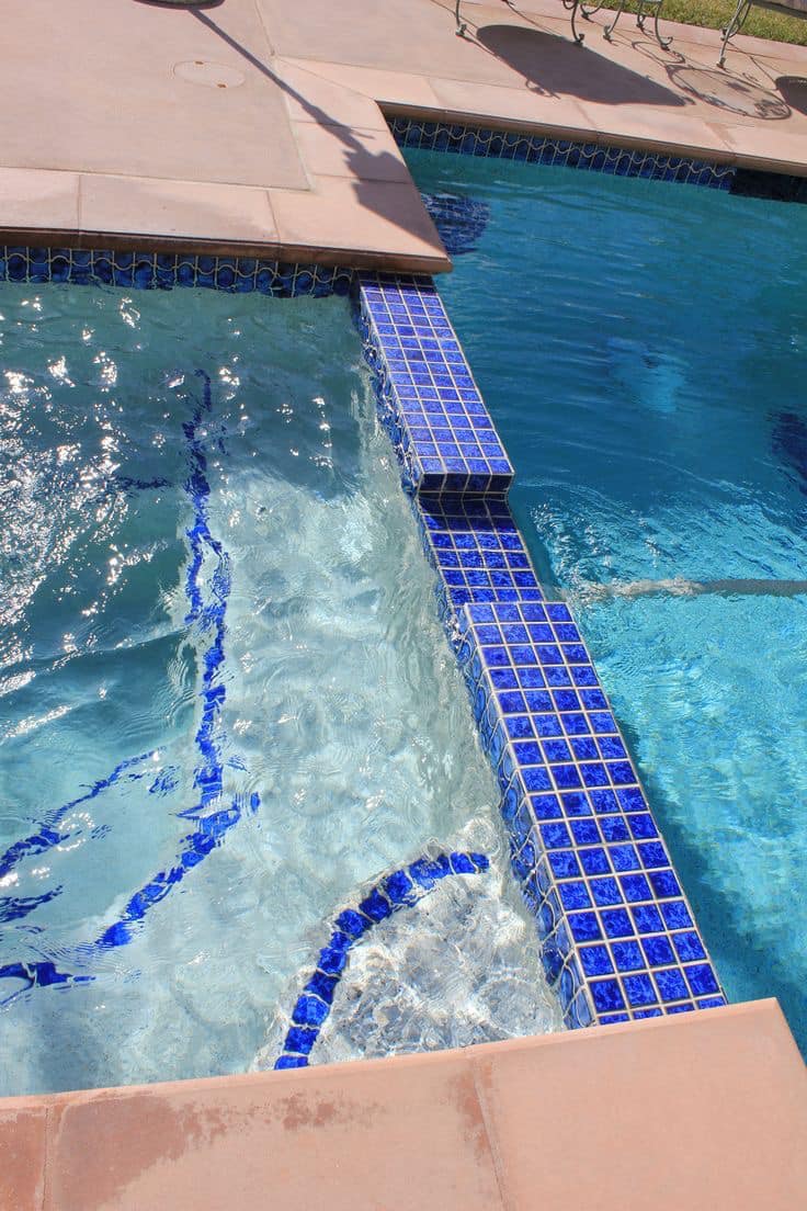 Blue cobalt mosaic on pool steps