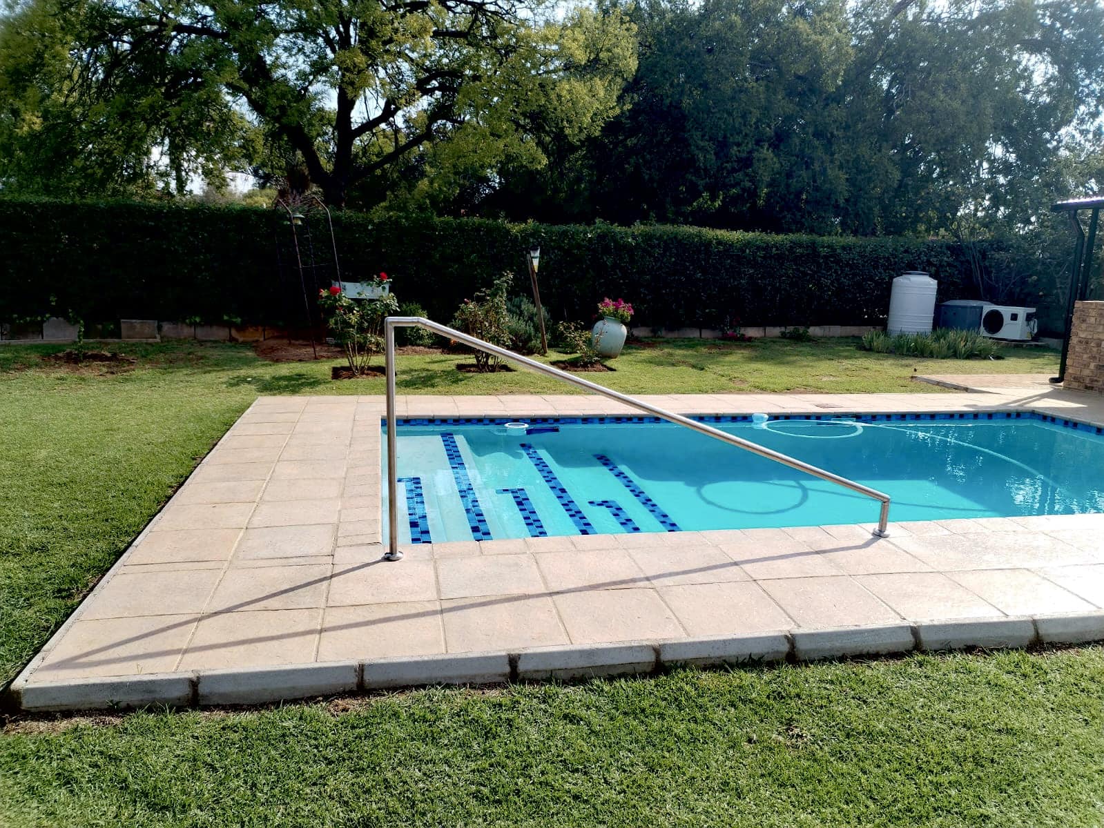 Rectangular pool with mosaic pattern